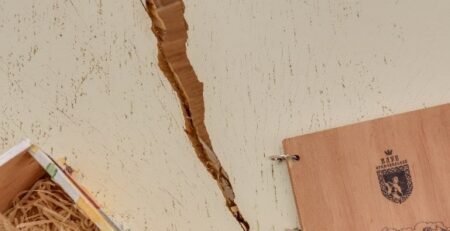 cracked wooden board and debris