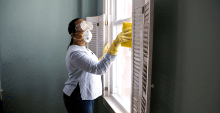 A person cleaning a house