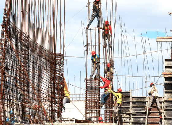 Workers working at a height on a construction site